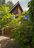 Home showcase exterior and trees