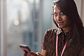 Businesswoman using smart phone