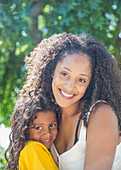 Portrait happy affectionate mother and daughter