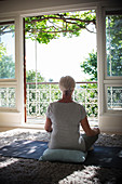 Senior woman meditating