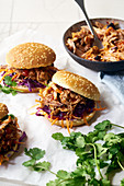 Pulled pork burgers with pickled and fresh vegetables