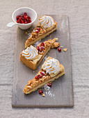 Apple pie with topped with meringue and pomegranate seeds