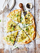 Potato Camembert and rosemary pizza with olive crumb
