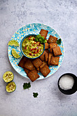 Guacamole and homemade crackers