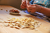 Women making Turkish pasta, Manti, Avanos, Nevsehir Province, Central Anatolia, Turkey