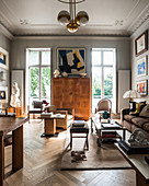 Classic beige living room with stucco ceiling in period building