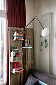 Bookshelves mounted on rustic wooden board