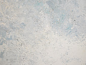 A grey-blue structured surface