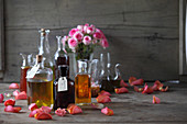 Various oils and oil extracts in glass bottles and carafes