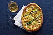 Vegetarian pizza with zucchini flowers, onion, courgette and cheese