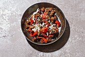 Oven-baed bread salad with black lentils, anchovies and tomatoes