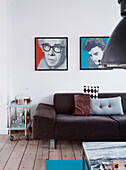 Modern art above sofa and serving trolley in living room