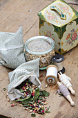 Cloth bag with dried herbs, flowers and spelt husks