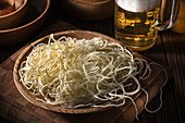 Cheese 'spaghetti' with beer