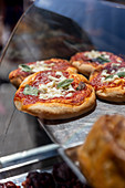 Pizzas being sold by a street vendor, Naples, Campania, Italy