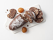 Sweet chocolate 'salami' with chestnuts and biscuit pieces