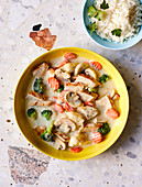 Quick chicken fricassee with mushrooms and carrots
