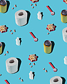 Patterns of hygiene supplies and soda cans on blue background with popcorn