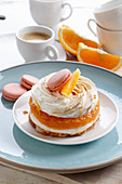 Mini cake with orange mousse and meringue