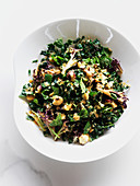 Kale chopped salad with mint, hazelnuts, sesame creamy dressing