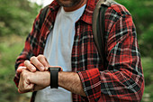 Smart watch on male hiker
