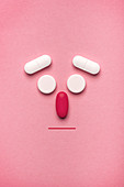 Emoticon made of pills and tablets