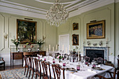 Festively set table in historic dining room