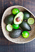 Bowl with fresh avocados and lime