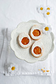 Easter egg shaped cookies with jam