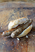 Roasted salsiccia game sausages in a roll (Tuscany)