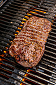 Beef steak on hot grill