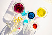 Glasses with colorful liquids