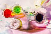 Glasses with colored liquids