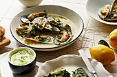 Cooked kiwi green mussels with wine, garlic and parsley