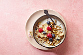Granola with nuts, oats, berries and milk