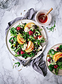 Apple and spinach salad with raspberries