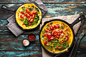 Italian healthy frittata with spinach, bell pepper and tomatoes