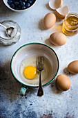 Open egg in bowl