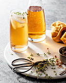 Yellow iced tea with thyme
