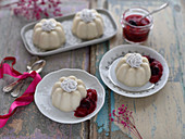 Vegan white polenta puddings with berry compote