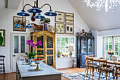 Old cupboard and display cabinet in dining room with classic decor