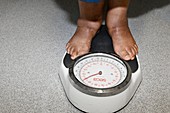 Patient being weighed