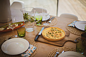 Fresh quiche ready on dining table