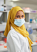 Portrait scientist in hijab and face mask in laboratory