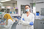 Portrait scientist in face mask and rubber gloves