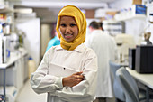 Portrait scientist in hijab working in laboratory
