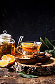 Warming tea with orange and lemon spices and honey
