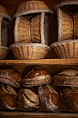 Breads and bread baskets in a bakery
