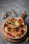 Rainbow vegetable tart with carrots, zucchini, aubergine and beetroot
