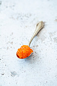 Trout caviar on a spoon